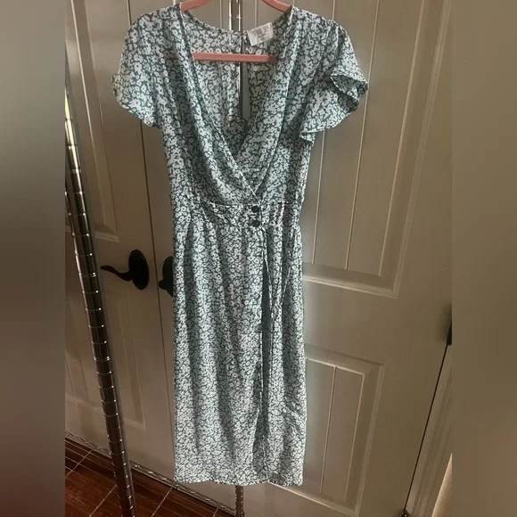 Sienna Sky A-Line midi dress. Size X-Small